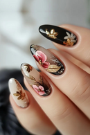 Nails with floral and gold leaf design on a neutral background, Obroi