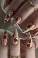 Nails with floral design featuring red flowers and gold accents,Obroi