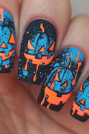 Nails with Halloween-themed design featuring  in blue and orange on a black background, Obroi