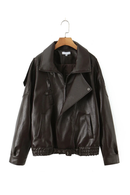 Obroi Brown leather jacket on a hanger against a white background