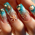 Close-up of a hand with long coffin-shaped nails decorated with a turquoise and nude gradient, glitter, seashell motifs, and starfish details, Obroi
