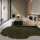 Modern bedroom with a bed, green rug, and minimal decor, Obroi