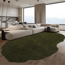 Modern living room with a large sectional sofa and a green rug, Obroi
