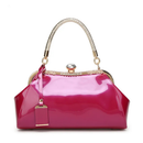 Pink handbag with gold accents on a white background, Obroi