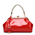 Red handbag with gold accents on a white background, Obroi