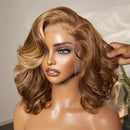 Mannequin head with a brown and blonde wig on a neutral , Obroi