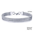 Silver bracelet with woven design on a white background, Obroi