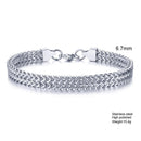Silver bracelet with woven design on a white background, Obroi