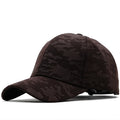 Dark brown cap with subtle pattern on a white background, Obroi