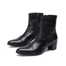 Black leather ankle boots with a block heel on a white background, featuring the brand 'Obroi'.
