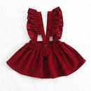 Red ruffled top and skirt set on a white background