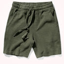 Green shorts with drawstring on a white background, Obroi