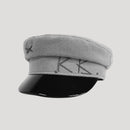 Gray cap with black visor on a light gray background, Obroi