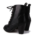 Black leather ankle boots with high heels on a white background, Obroi