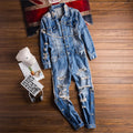 Denim jumpsuit with distressed details on a wooden surface, Obroi
