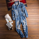 Denim jumpsuit with distressed details on a wooden surface, Obroi