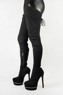 Black suede over-the-knee high-heeled boots on a white background, Obroi