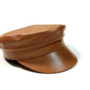 Brown leather cap on a white background, Obroi