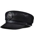 Black mesh cap with decorative emblem on a white background, Obroi