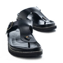 Black sandals with buckles on a white background, Obroi