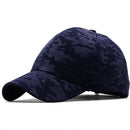 Navy blue camouflage-patterned baseball cap on a white background, Obroi
