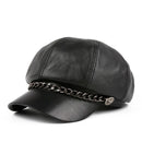 Black leather cap with chain detail on a white background, Obroi