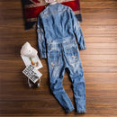Denim jumpsuit on a wooden surface with a British flag in the background, Obroi