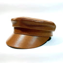 Brown leather cap on a white background, Obroi