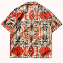 Short-sleeve shirt with a vibrant geometric pattern on a beige background, Obroi