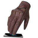 Brown leather glove on a white background with a smartphone below, Obroi