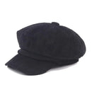 Black corduroy cap on a white background, Obroi
