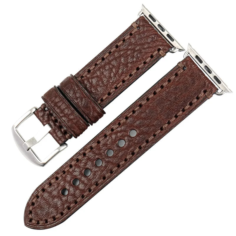 Dark brown leather watch strap with silver hardware on a white background