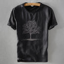 Black t-shirt with tree design on a gray background