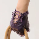 Purple ballet shoe with lace details on a white background, Obroi
