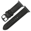 Black leather watch strap on a white background
