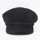 Black corduroy cap on a white background, Obroi