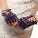 Purple leather gloves with lace detailing on a white lace background, Obroi