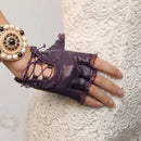 Purple leather half-mitten glove with lace details on a textured white background, Obroi