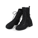 Pair of black lace-up boots on a white background, Obroi