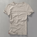 Beige t-shirt on a gray background, Obroi