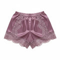 Purple satin shorts with lace trim on a white background, Obroi