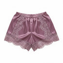 Purple satin shorts with lace trim on a white background, Obroi