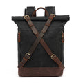 Black roll-top backpack with brown straps on a white background, Obroi