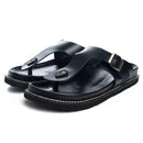 Black sandals with a strap on a white background, featuring the Obroi brand.