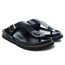 Pair of black sandals with gold buckles on a white background, Obroi