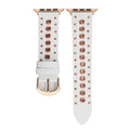 White watch strap with rose gold studs and rose gold buckle on a white background, Obroi