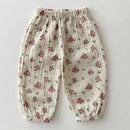 Floral patterned baby pants on a light gray background, Obroi