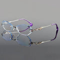 Pair of decorative eyeglasses with intricate design on a gray background, featuring the brand 'Obroi'.