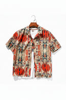 Short-sleeve shirt with a colorful geometric pattern on a hanger against a white background, Obroi