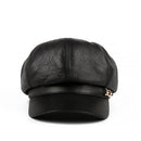 Black leather cap with a gold emblem on a white background, Obroi